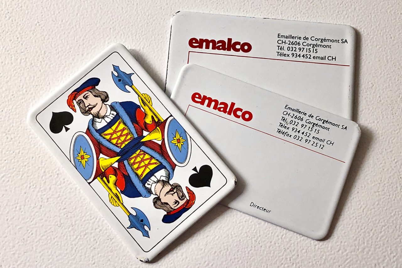 This image has an empty alt attribute; its file name is 1975-Emalco-Businesscard-1280x854.jpg